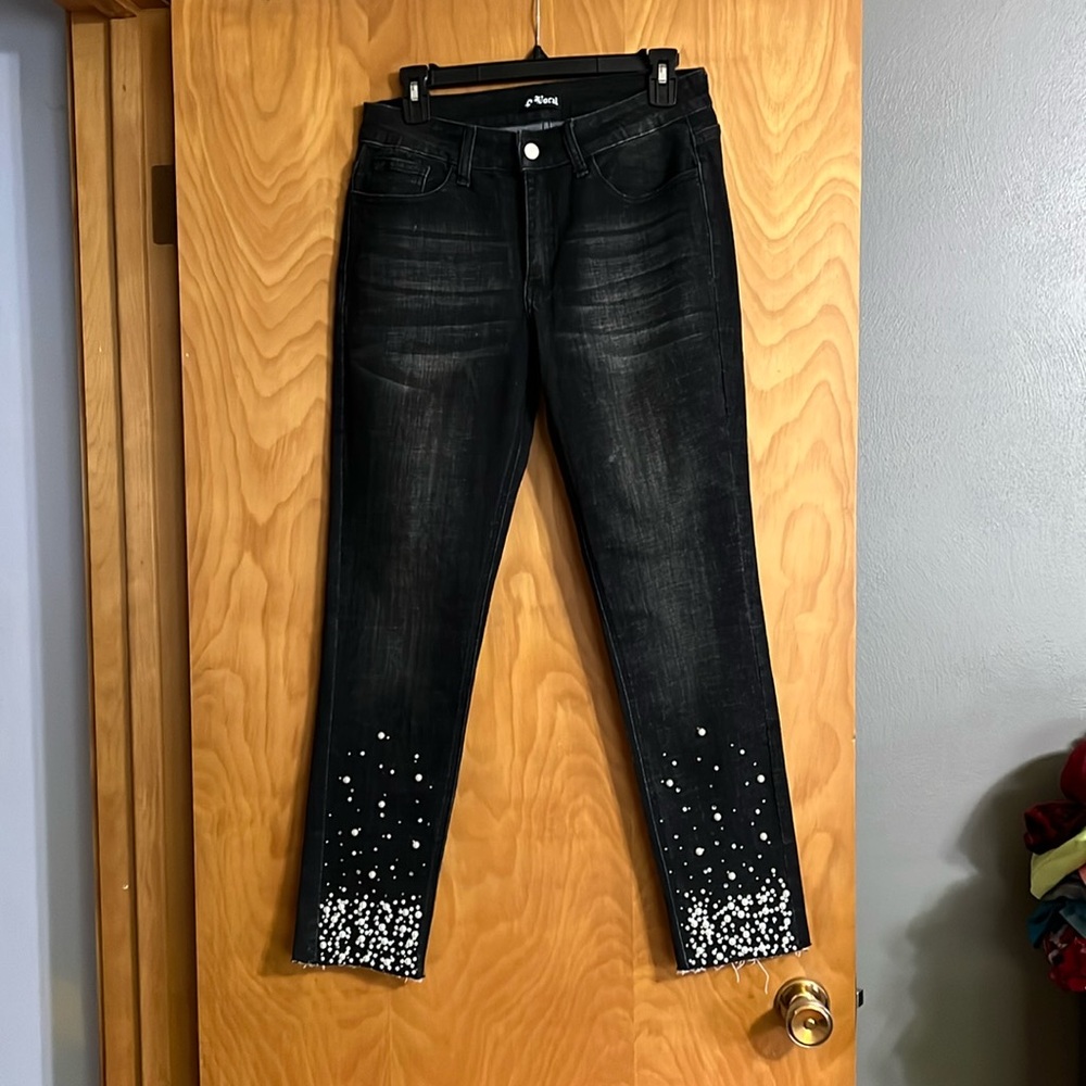 Vocal Jeans size large pearls in bottom. NWOT